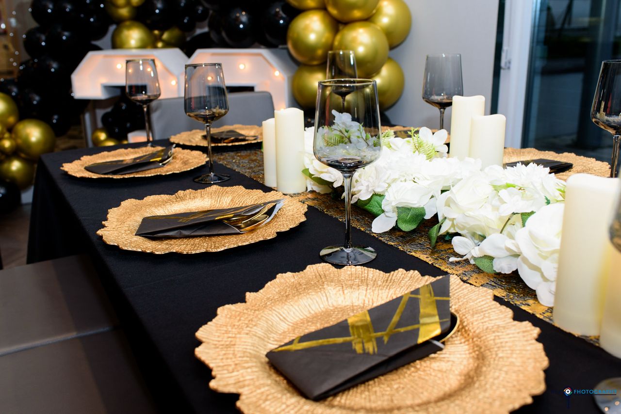 Black and gold luxury tablescape by Veloura Experience